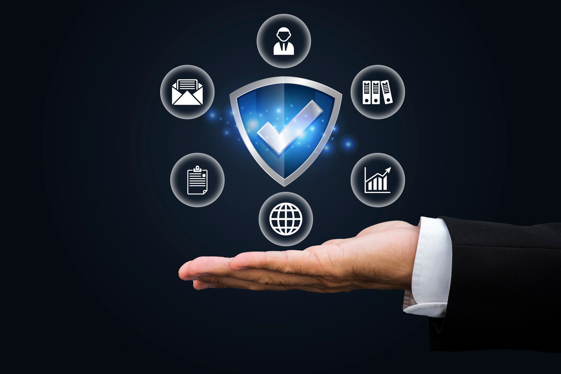 Graphic of business professional's hand under technology and cyber security icons